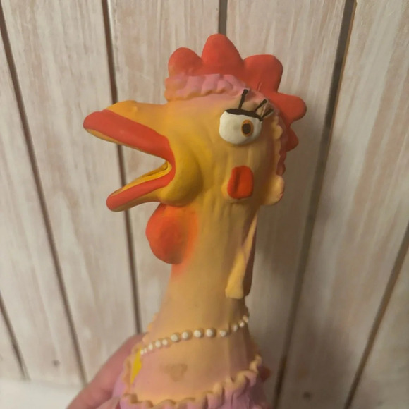 Lady squeaking chicken - Picture 3 of 6